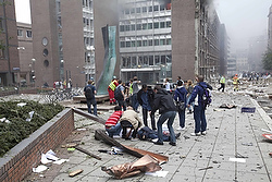 MEN HELP WOUNDED MAN AFTER POWERFUL EXPLOSION IN NORWAY