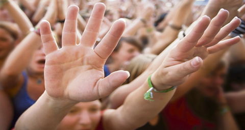 9-KIDS-HANDS-RAISED