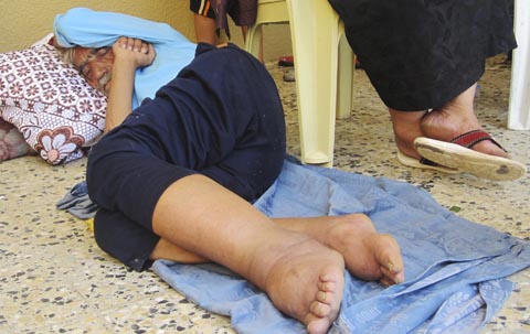 Christian refugee rests at St. JosephÕs Church in Ankawa, Iraq
