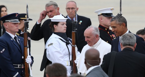 Pope Francis walks with U.S. President Barack Obama after the pontiff arrived at Joint Base Andrews in Maryland Sept. 22. (CNS photo/Bob Roller) See POPE-US-ARRIVE Sept. 22, 2015.