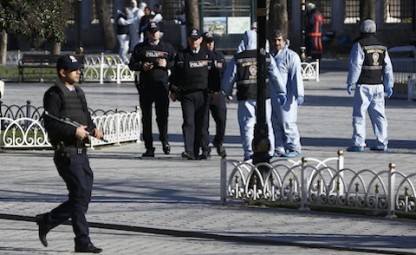 Police secure the area after a Jan. 12 explosion near the Blue Mosque in Istanbul. The explosion killed at least 10 people, mostly foreigners, and wounded 15 others, officials said. (CNS photo/Murad Sezer, Reuters)