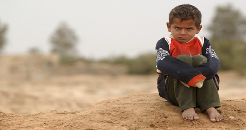 10---Pouting_boy_in_Shamar,