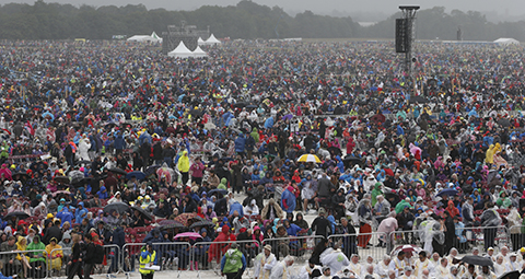Worshippers wait for Pope Francis to celebrate Mass at Phoenix Park in Dublin Aug. 26. (CNS photo/Paul Haring) See POPE-DUBLIN-MASS Aug. 26, 2018.