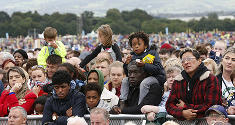 Worshippers wait for Pope Francis to celebrate Mass at Phoenix Park in Dublin Aug. 26. (CNS photo/Paul Haring) See POPE-DUBLIN-MASS Aug. 26, 2018.